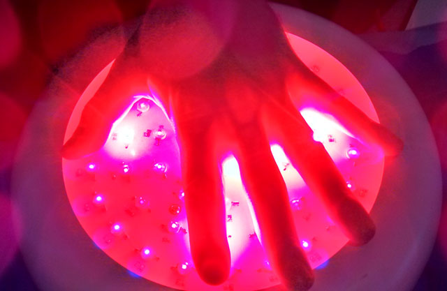 infrared light with hand covering partially